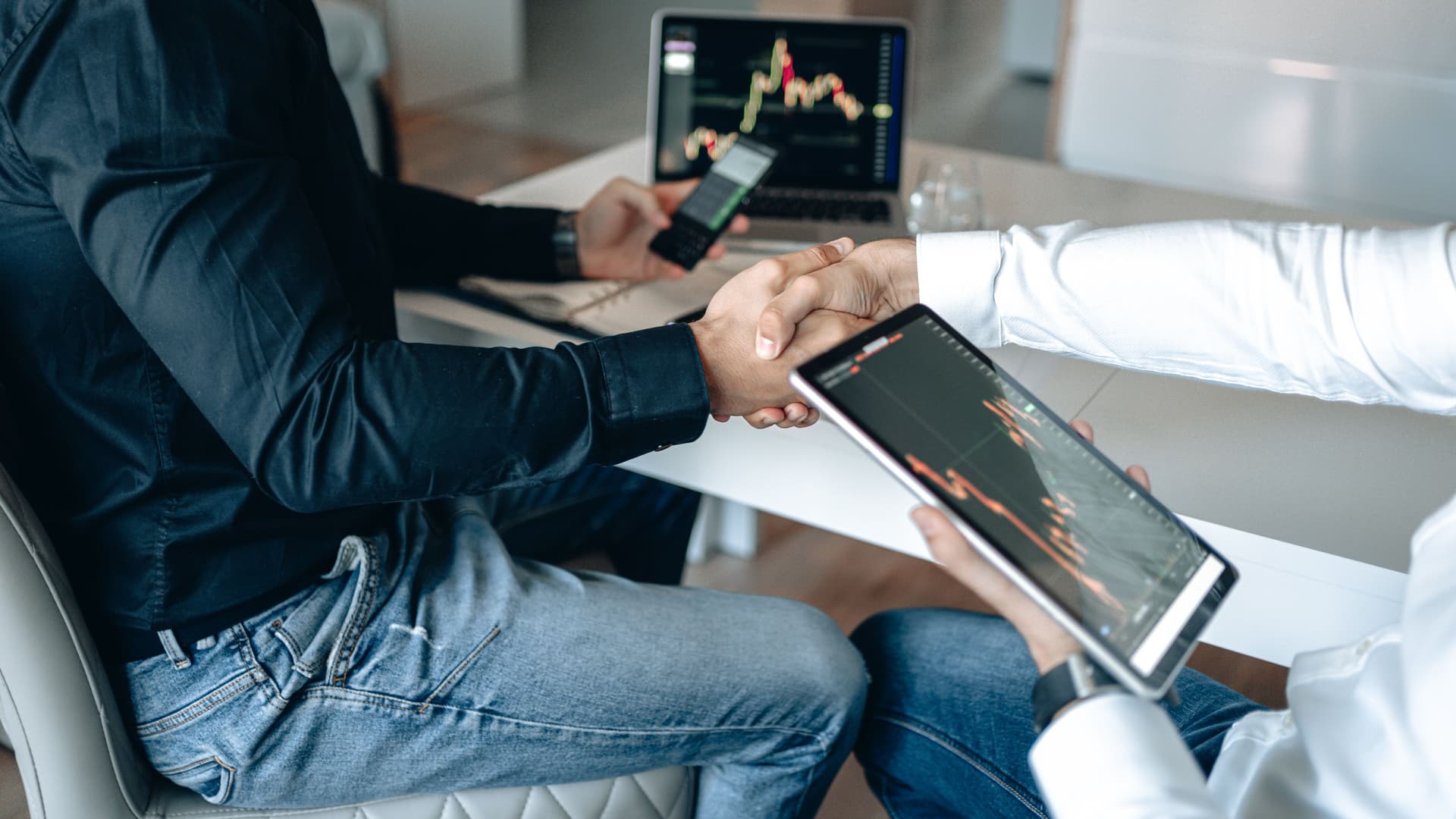 Business partners reviewing financial information together